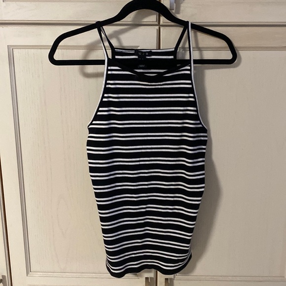 U2B Tops - A Black and white striped tank top in 1X